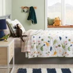 Dinosaur Poly Cotton Reversible Kids' Quilt - Pillowfort™